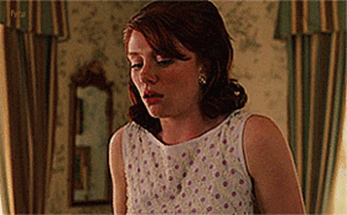 Woman in White Dress With Pink Polka Dots