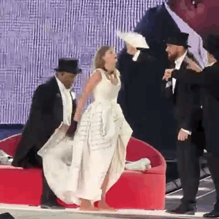 Woman in White Dress with Tuxedo Men and Hats