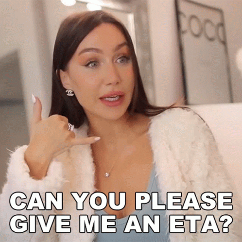 Woman In White Fur Coat Asking For ETA GIF
