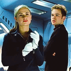Woman In White Gloves Next To Man GIF