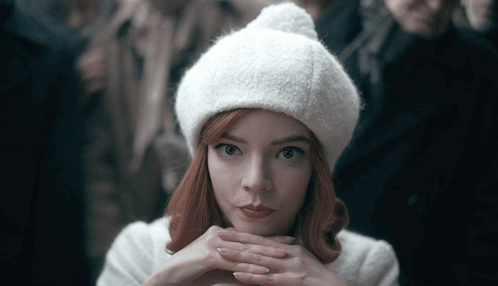 Woman In White Hat And White Coat GIF