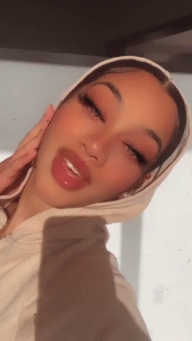 Woman In White Hoodie Taking Selfie GIF