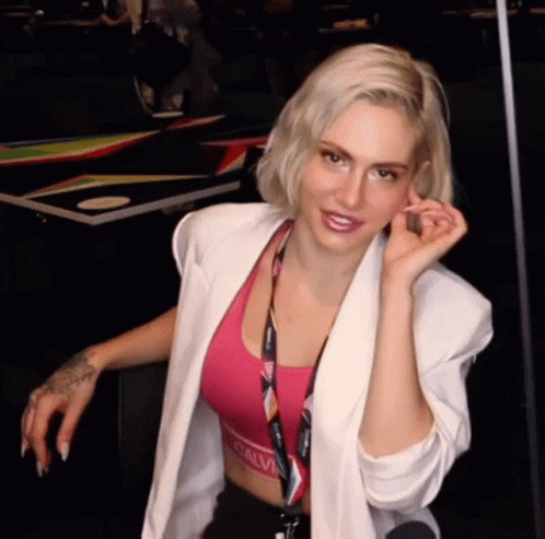 Woman In White Jacket And Pink Calvin Klein Bra GIF