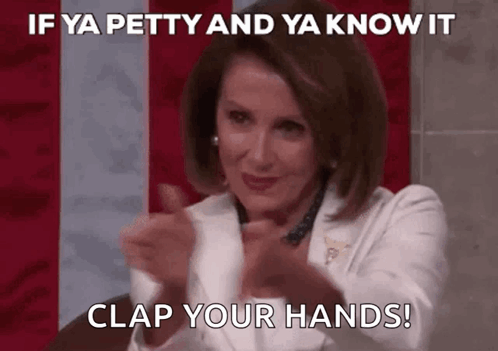 Woman in White Jacket Clapping Red White Blue Flag