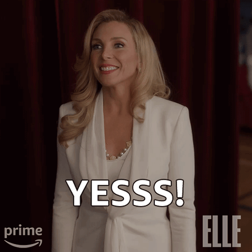 Woman In White Jacket Says Yesss GIF