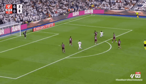 Woman in White Jersey Number 2 Throwing Soccer Ball