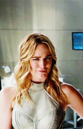 Woman In White Making Silly Face GIF