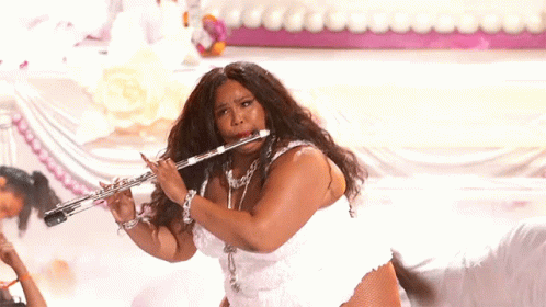 Woman in White Playing Flute