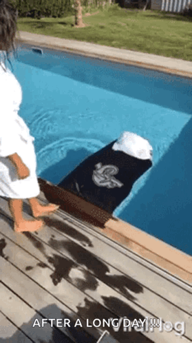 Woman in White Robe by Pool
