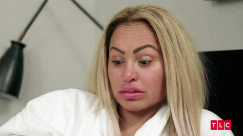 Woman In White Robe With TLC GIF