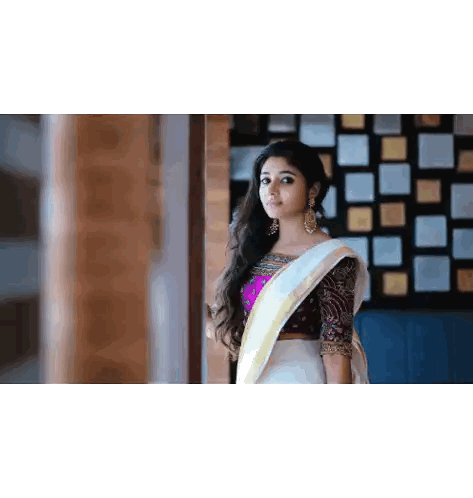 Woman in White Saree and Pink Blouse