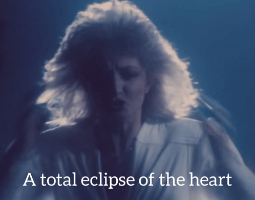 Woman in White Shirt A Total Eclipse of the Heart