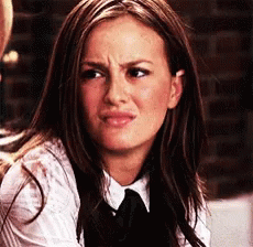 Woman In White Shirt And Black Tie Making Funny Face GIF