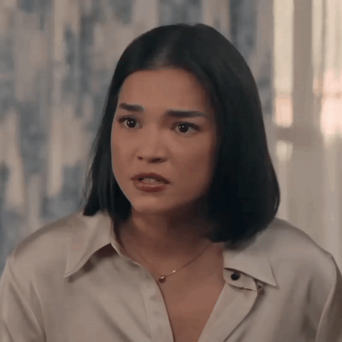 Woman In White Shirt And Necklace GIF