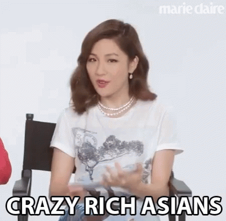 Woman in White Shirt and Pearl Necklace Talking