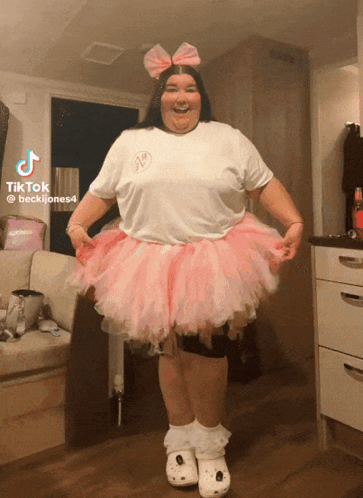 Woman in White Shirt and Pink Tutu TikTok