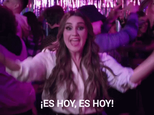 Woman in White Shirt Dancing and Saying es hoy es hoy