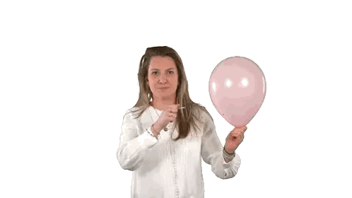 Woman in White Shirt Holding Pink Balloon