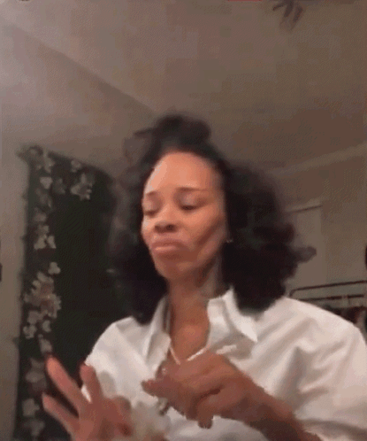 Woman in White Shirt Making Funny Face with Cell Phone