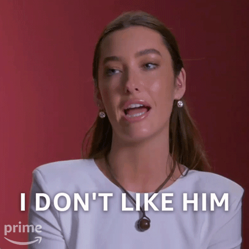 Woman in White Shirt Saying I Don't Like Him