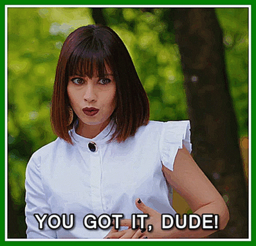 Woman in White Shirt Saying You Got It Dude