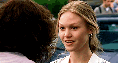 Woman In White Shirt Smiling At Man GIF