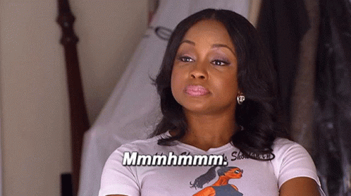 Woman In White Shirt With Woman Picture Says Mmmmhhmm GIF