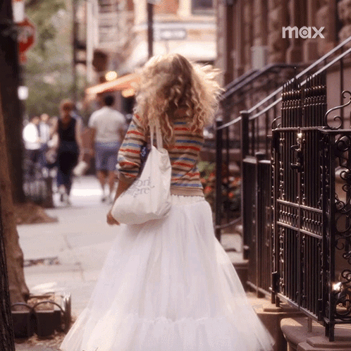 Woman in White Skirt Walking