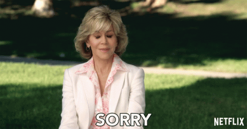 Woman In White Suit Saying Sorry GIF