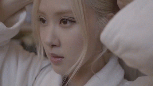 Woman in White Sweater Close Up