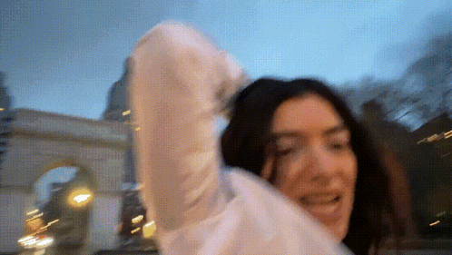 Woman In White Sweater GIF