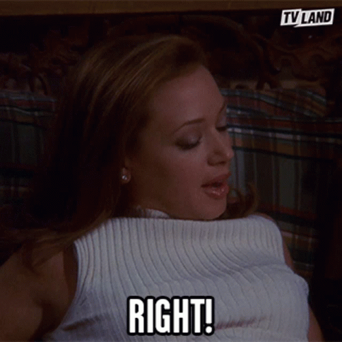 Woman in White Sweater Saying Right
