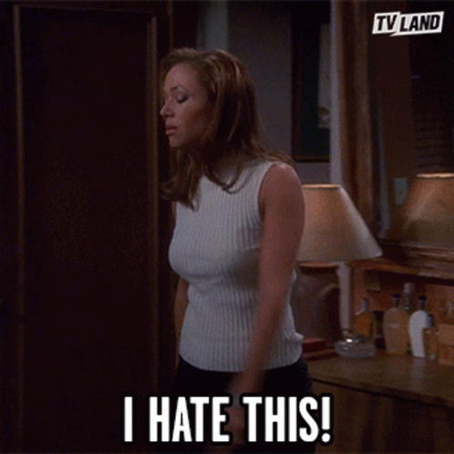 Woman in White Sweater Says I Hate This