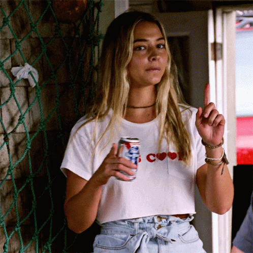 Woman in White T-Shirt Holding Pabst Blue Ribbon Beer