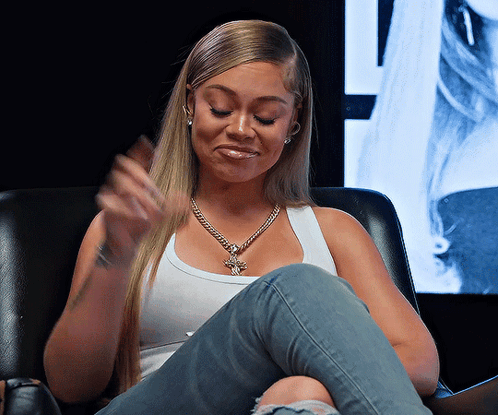 Woman In White Tank Top And Cross Necklace GIF