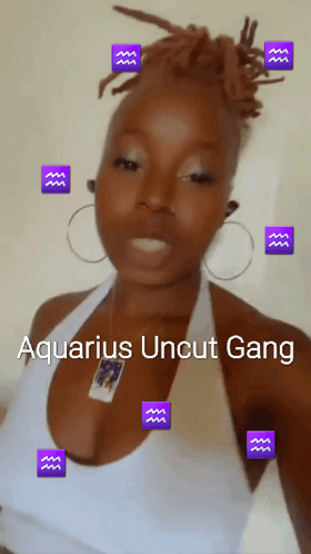 Woman in White Tank Top Surrounded by Purple Water Signs Aquarius Uncut Gang