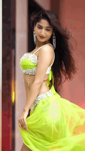 Woman in White Top and Green Skirt