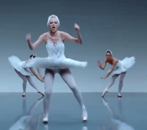 Woman in White Tutu Dancing with Two Others