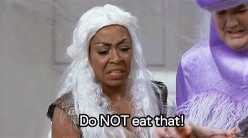 Woman in White Wig Holding Meat Saying Do Not Eat That