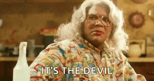 Woman In Wig And Glasses It's The Devil GIF