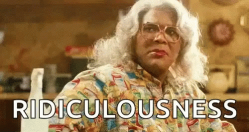 Woman In Wig And Glasses With Spray Bottle Ridiculousness GIF