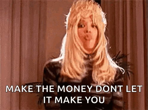 Woman In Wig Blowing Kiss Says Make The Money Don't Let It Make You GIF