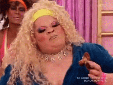 Woman In Wig Eating Chicken, Another Looks GIF