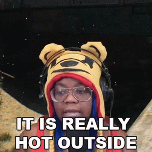 Woman in Winnie the Pooh Hat and Headphones Says It Is Really Hot Outside