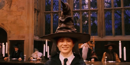 Woman in Wizard Hat Smiling