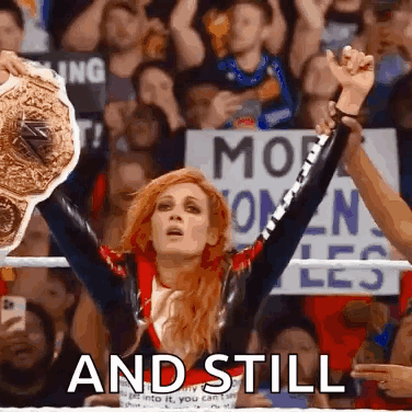 Woman In Wrestling Ring Holding Championship Belt Saying And Still GIF