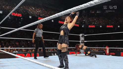 Woman in Wrestling Ring Saying Raw