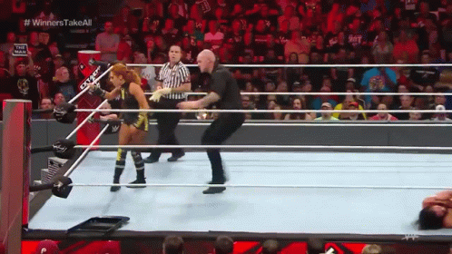 Woman In Wrestling Ring Saying Winners Take All GIF