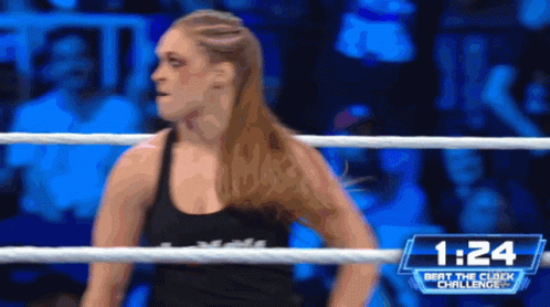 Woman In Wrestling Ring With 1:24 GIF