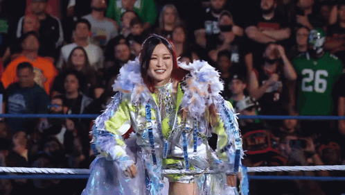 Woman in Wrestling Ring With Number 26 Jersey